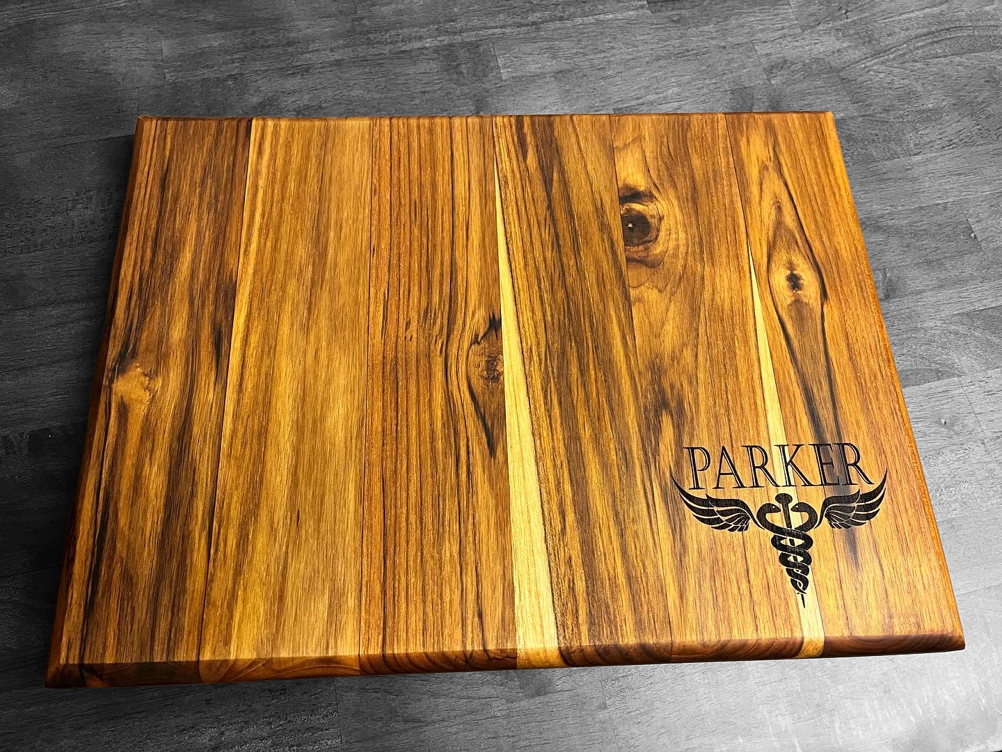 Get Your Design on our Signature Teak Cutting Board
